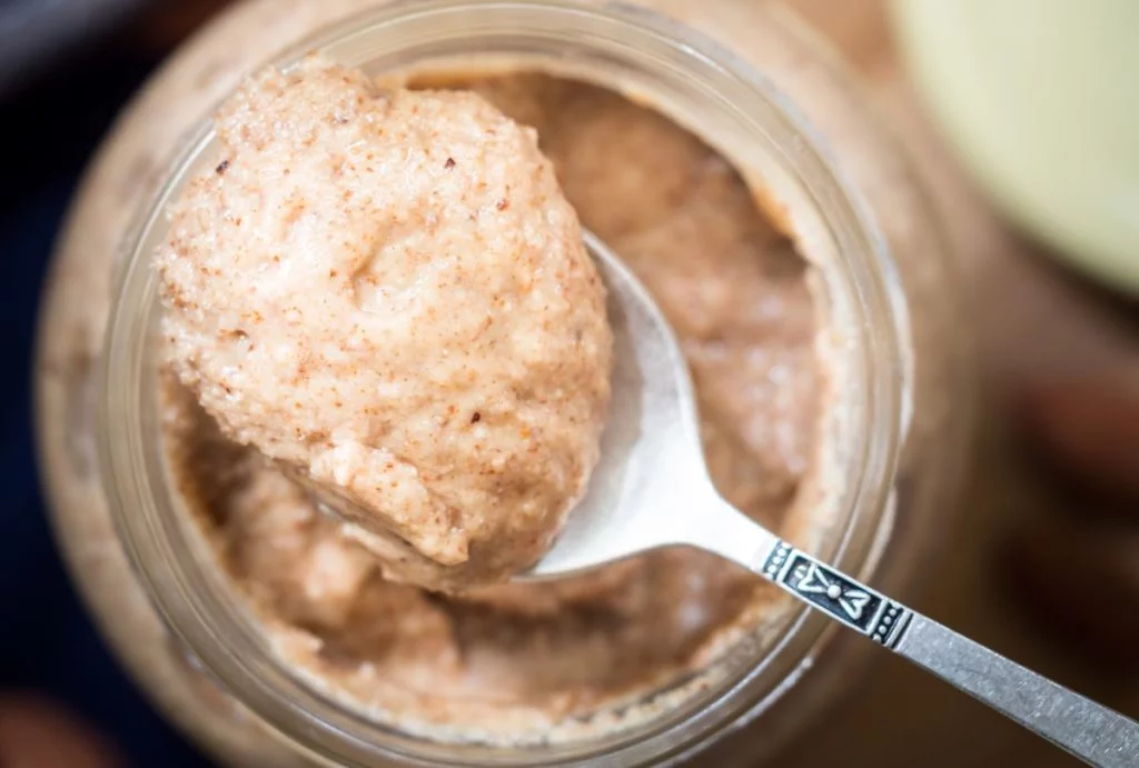 Glass jar of homemade almond butter