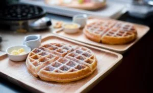Ready made waffles served with syrup and butter