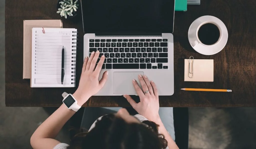Female student studying at a desk