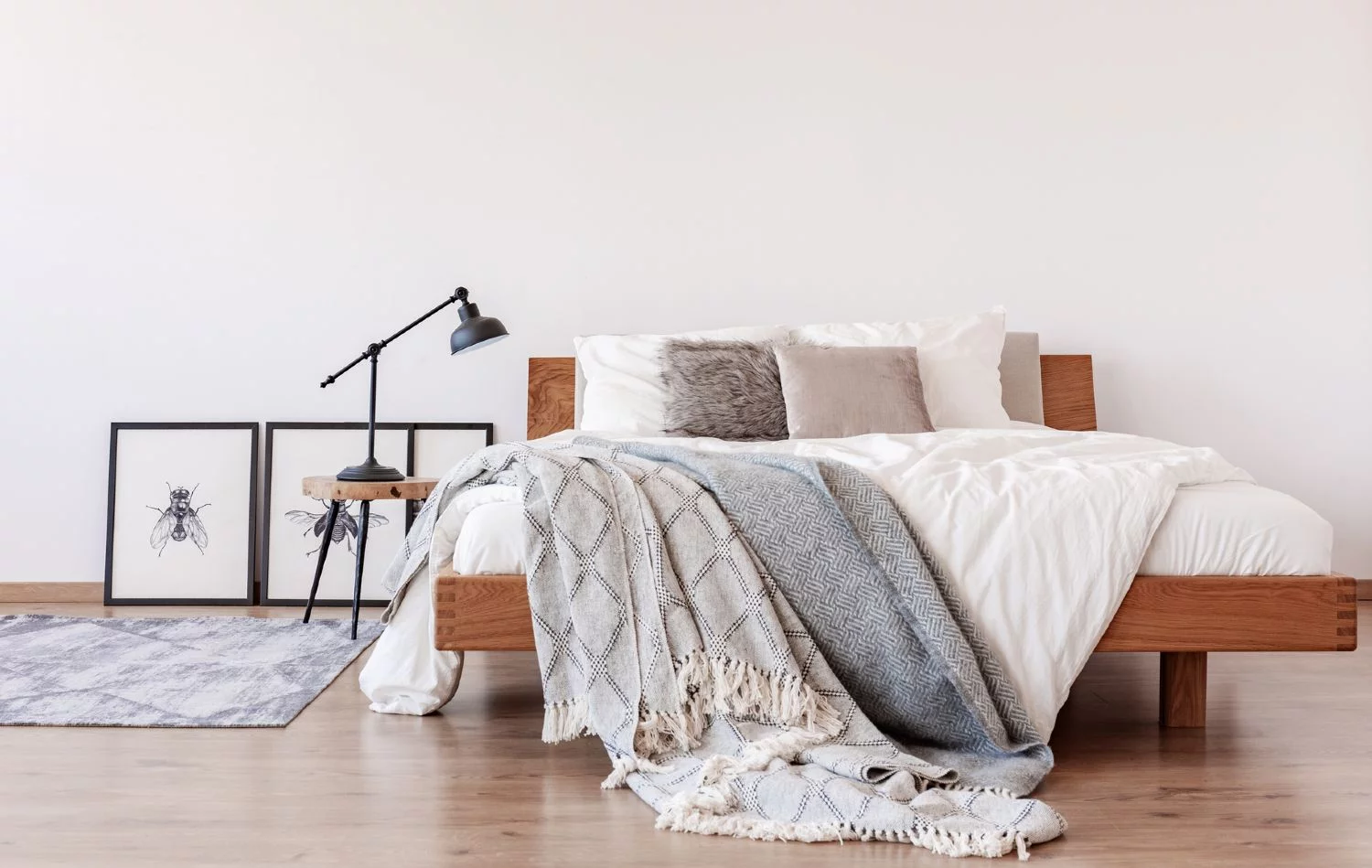 Modern bedroom with a wooden bed frame