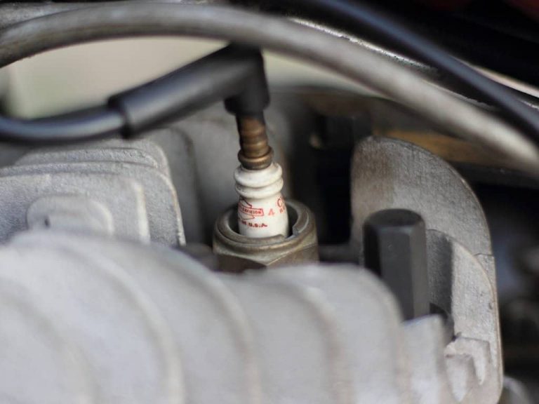 How to test a spark plug on a lawnmower with a tester